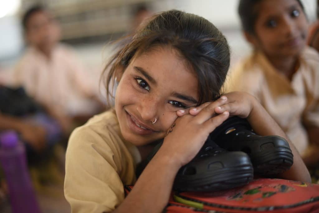 Nana Au-Chua and Soles4Souls go to India to “Give Shoes, Give Love”