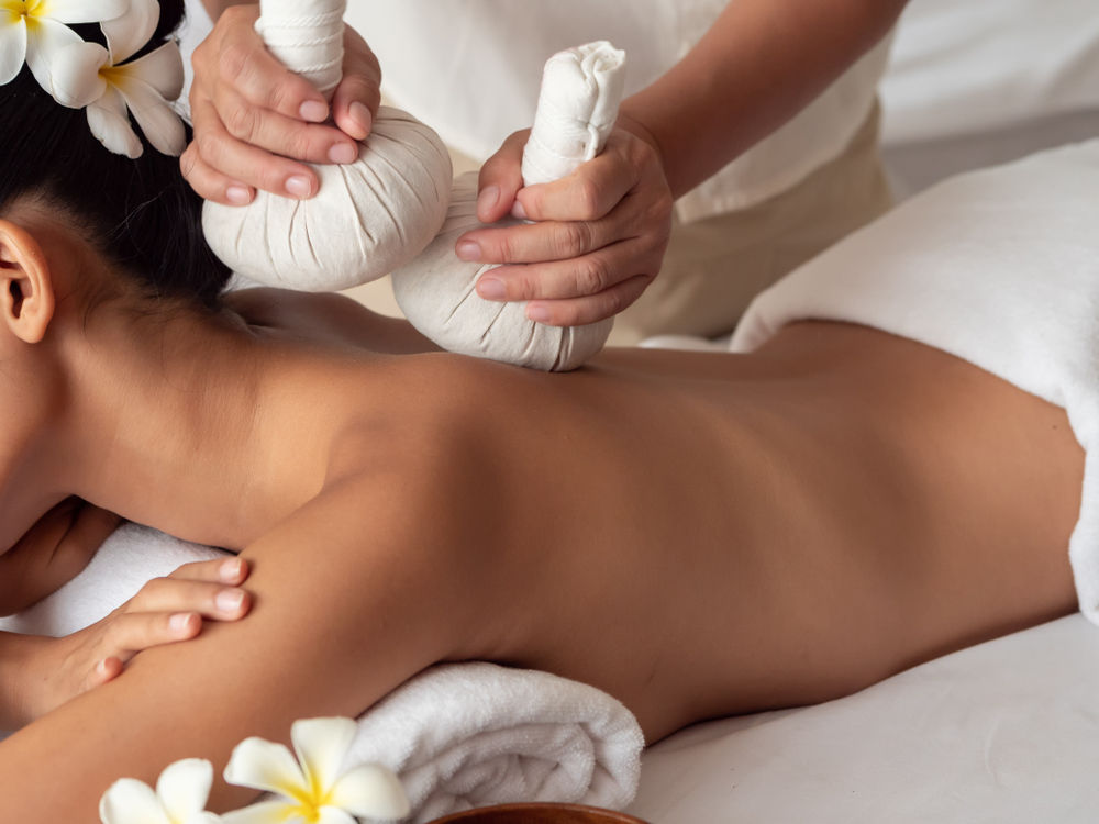 Thai herbal compress treatments, new at Sense of Touch