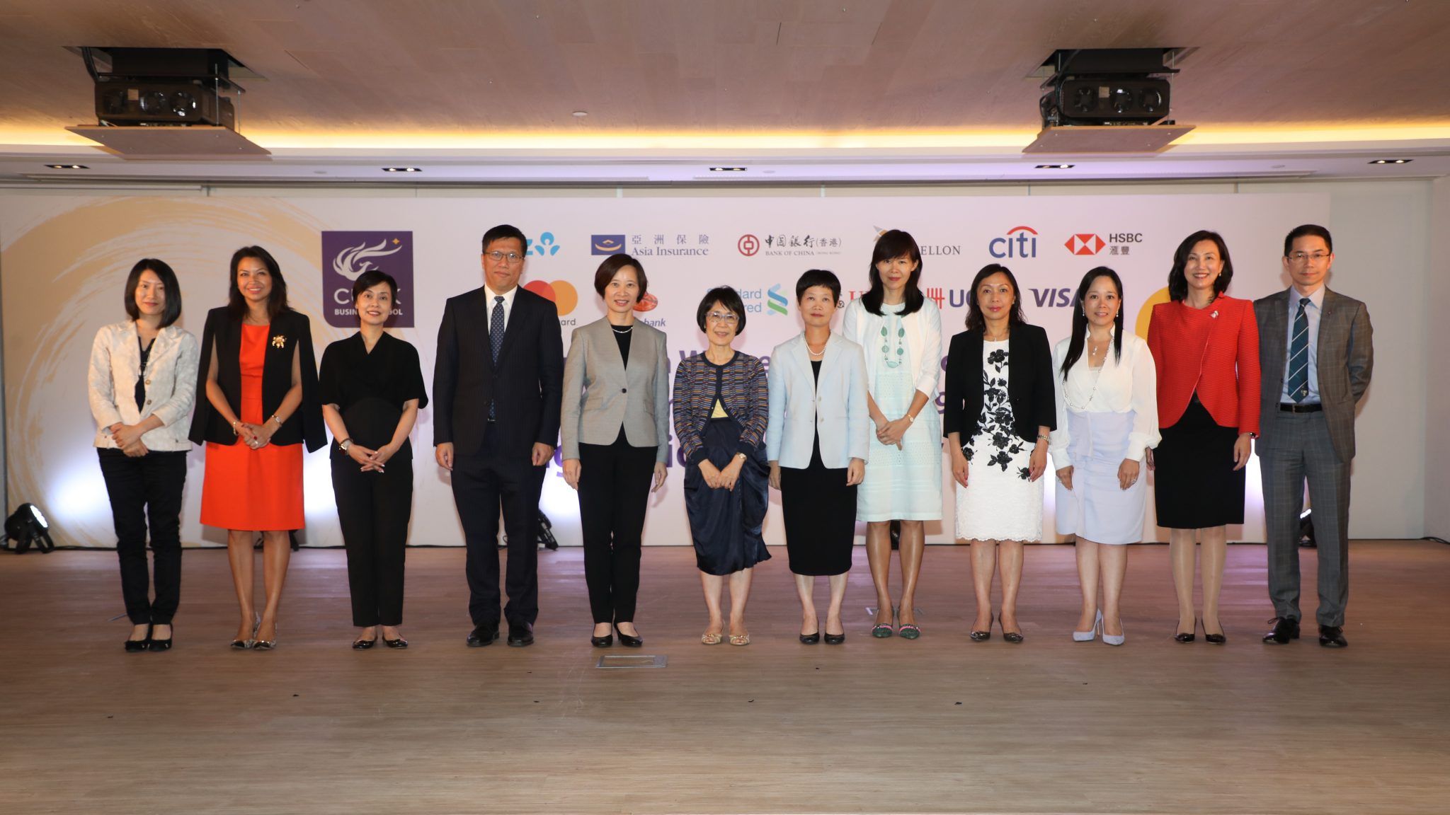 Claire at the launch of CUHK Business School's Dialogue with Women CEOs and Mentorship Programme 2018-19. Here she is pictured with professors and other women leaders, she's second from the left.