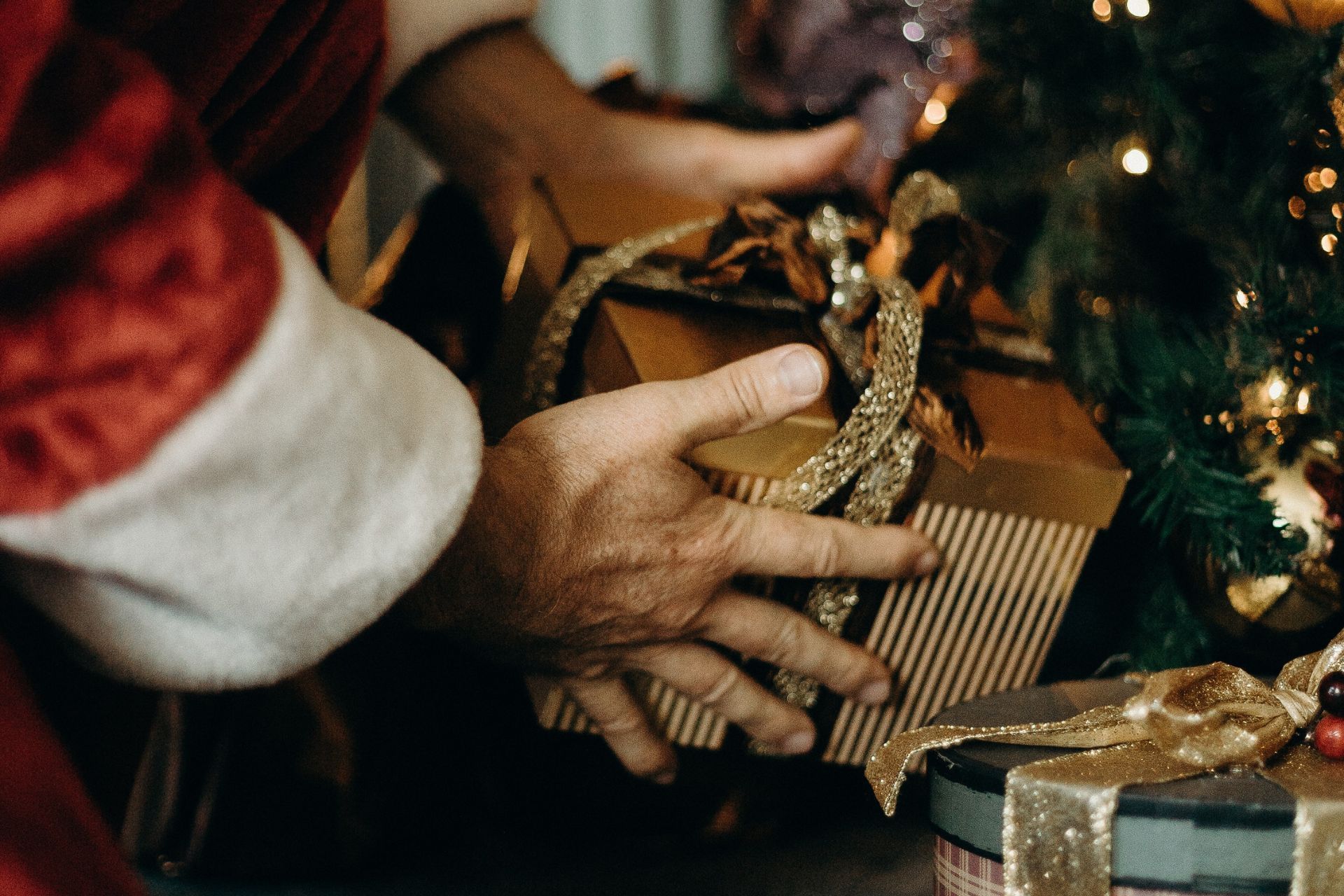 Putting gifts under the tree