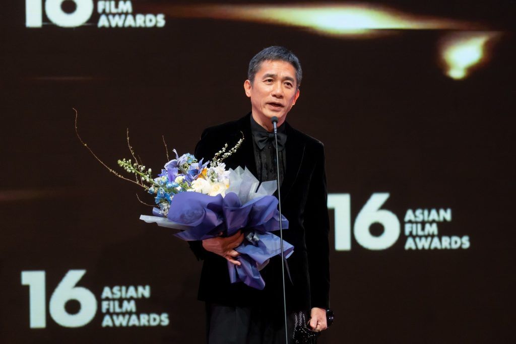 Tony Leung picks up his prize for Asian Film Contribution at the 16th Asian Film Awards