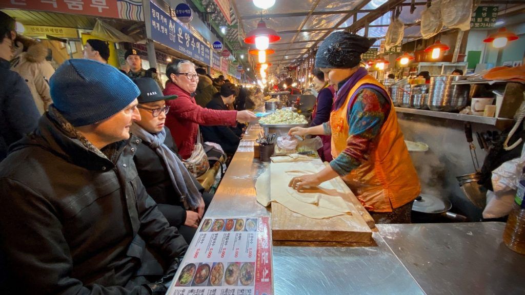Phil Rosenthal sampling street food in Seoul