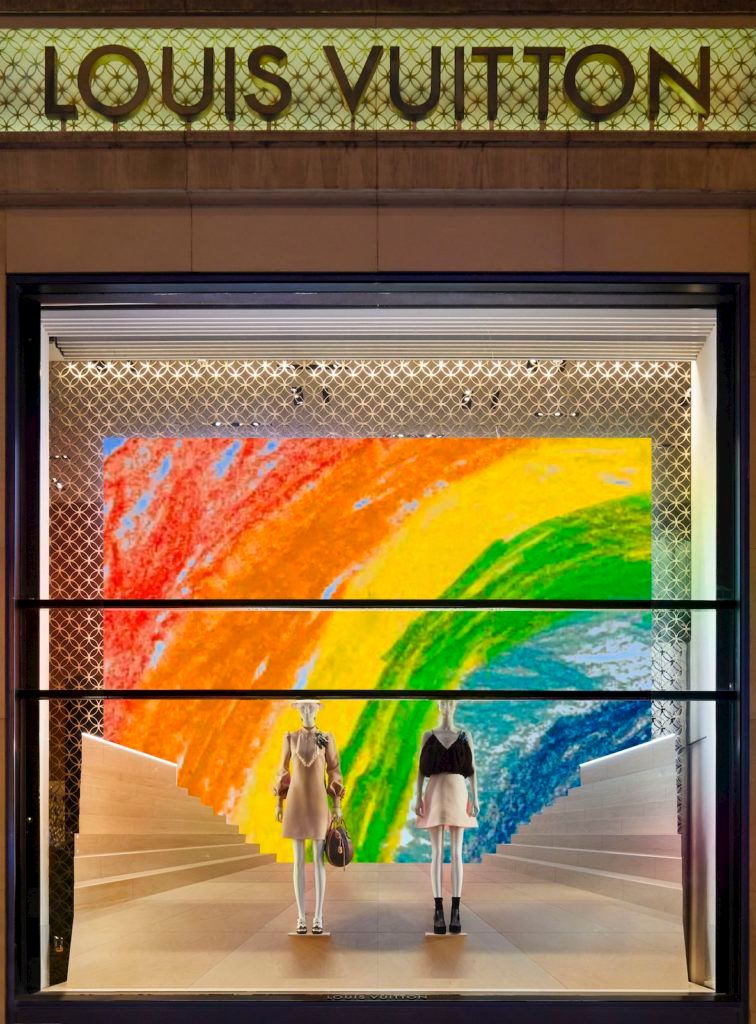 LV (Louis Vuitton), Colorful logo on display window of a Lo…