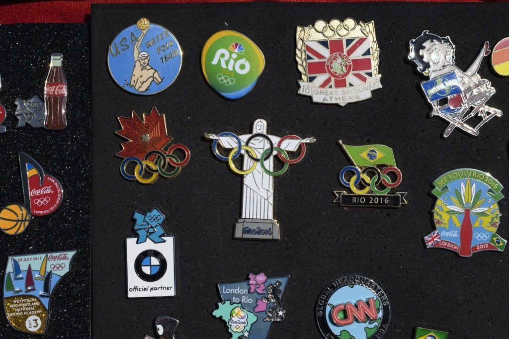 The “unofficial sport” of the Olympics is Olympic pin trading. What is it?