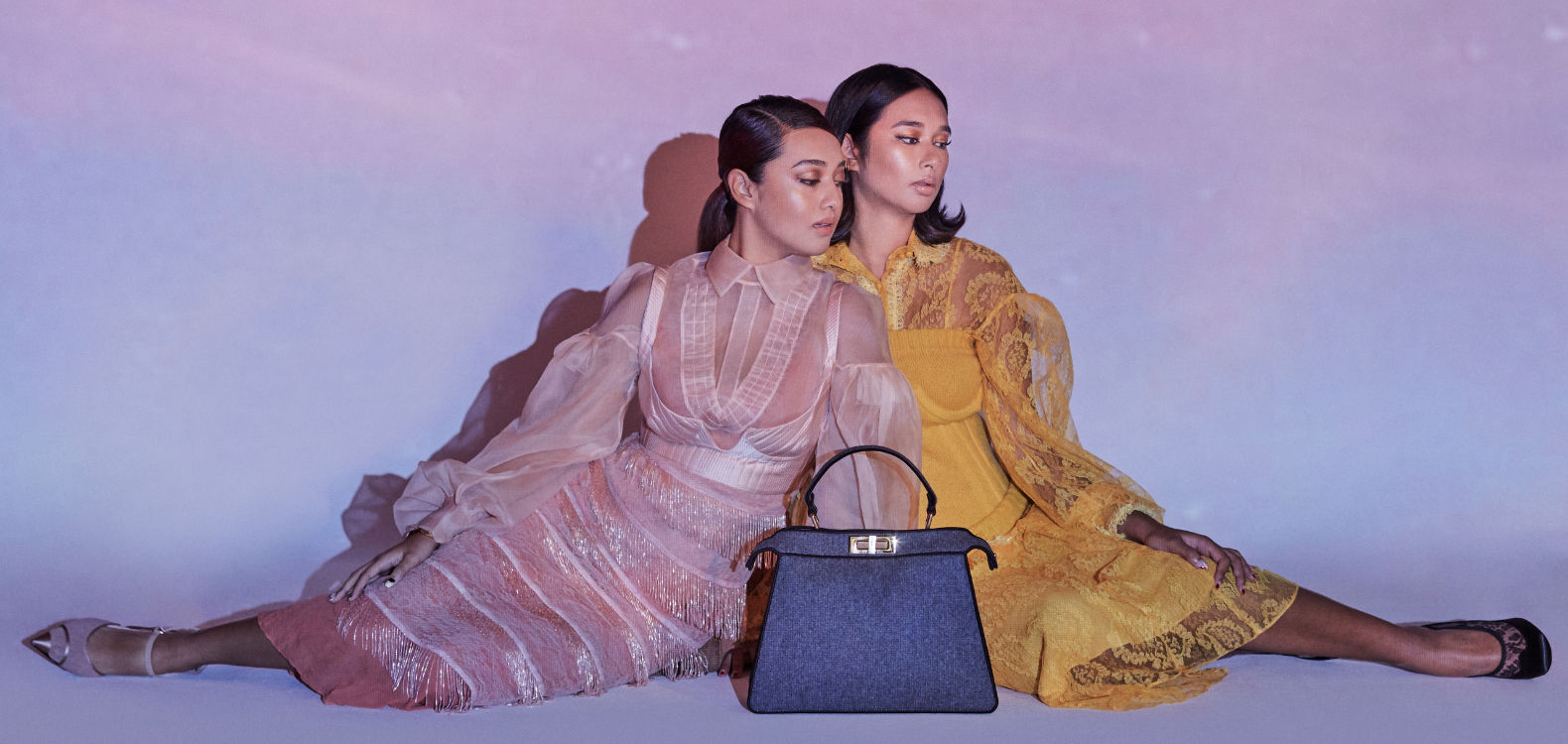 Sister Act: Ally and Serena Mukhriz in Fendi’s Fall Winter 2020/2021 Womenswear collection