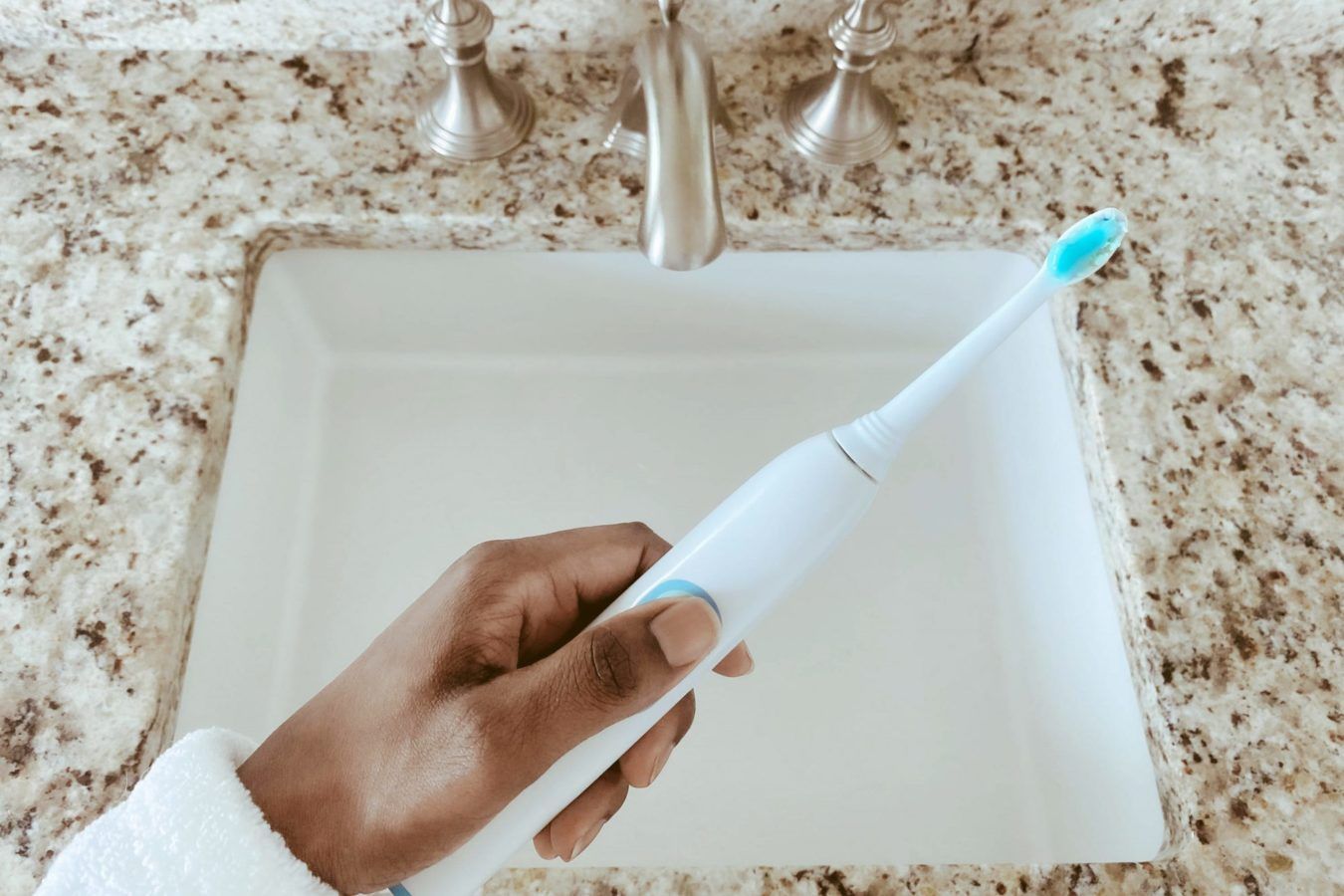 How does a manual toothbrush stack up against electric?