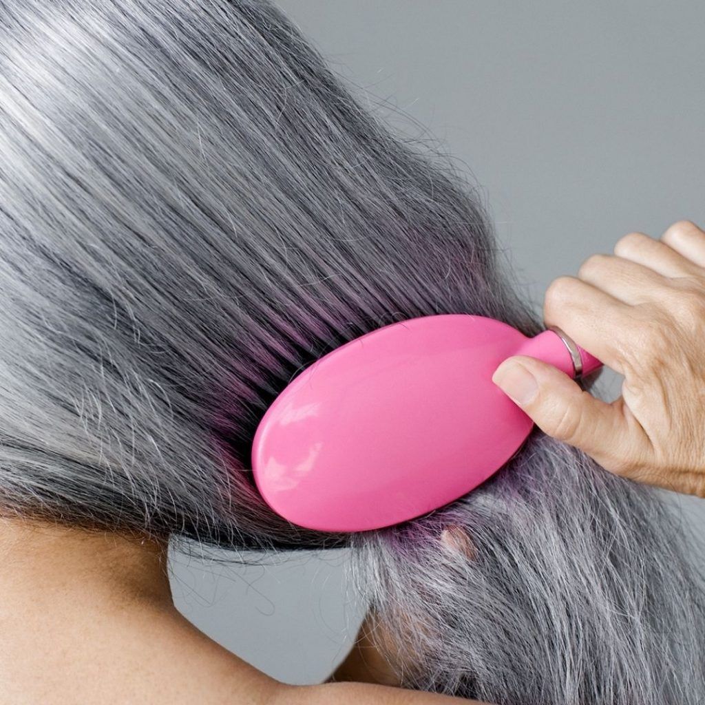 How to brush your hair the right way, according to stylists
