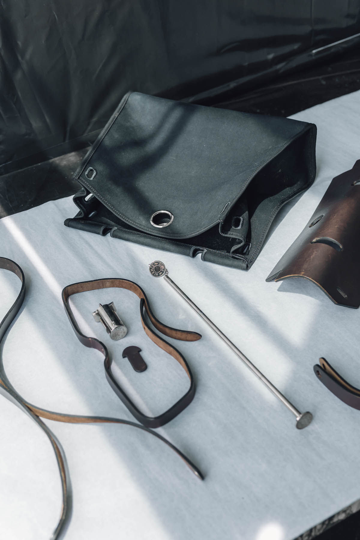 Restoring this Louis Vuitton begins with disassembling it – a careful