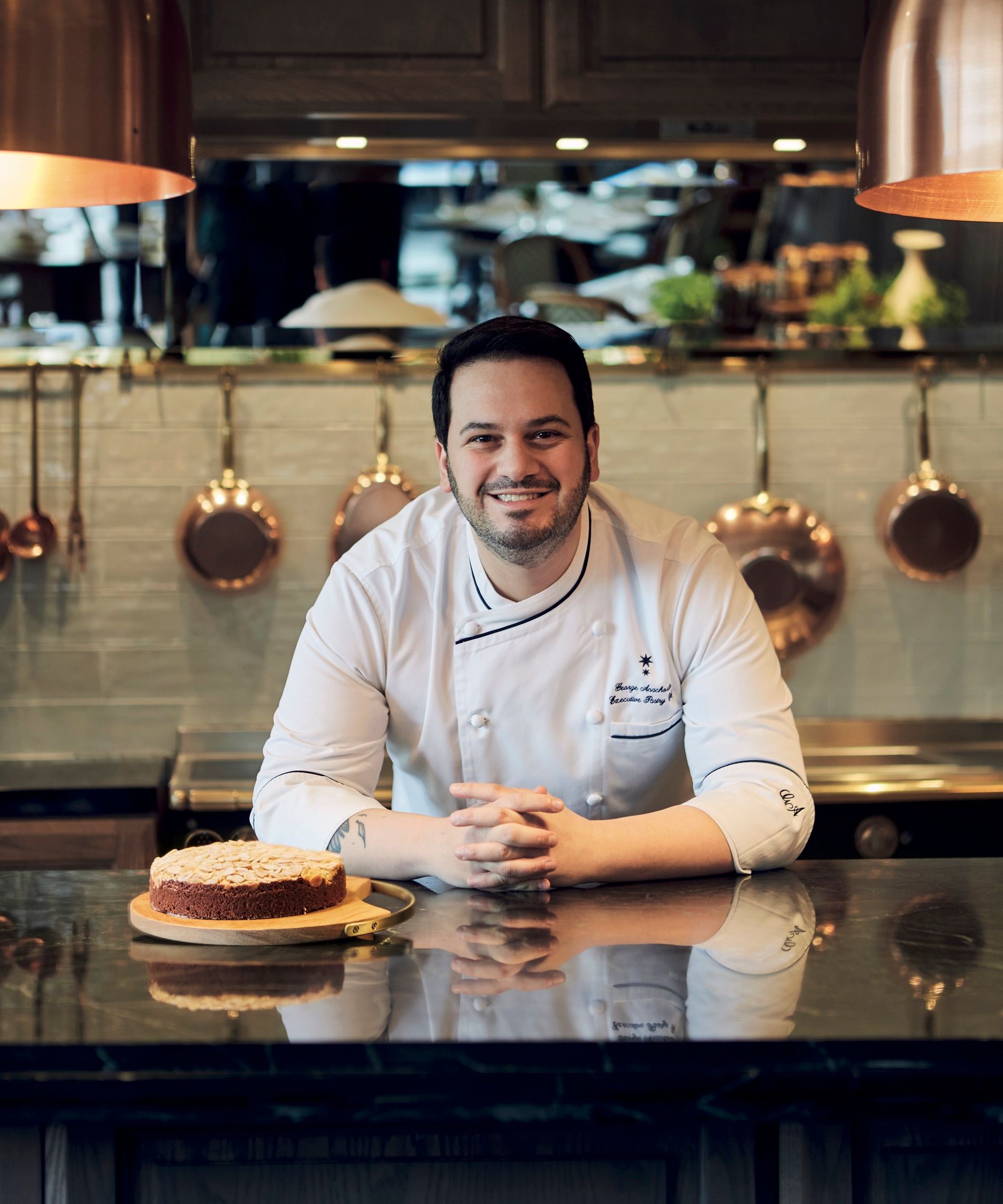 Anachorlis of Capella Singapore on his Greek almond olive oil cake