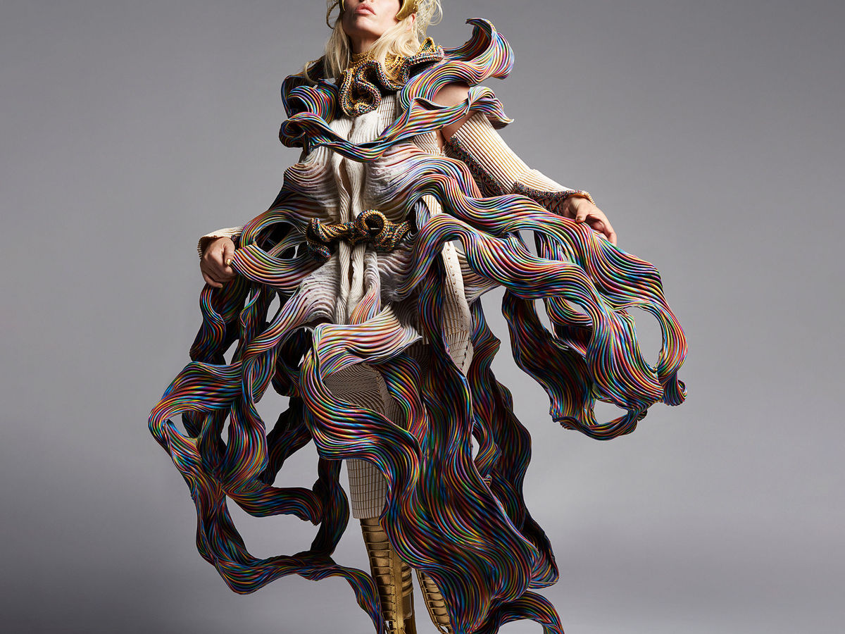 dress made out of spider silk This dress is made purely of the silk from Golden Orb spiders. It has no added colouring whatsoever. : r/interestingasfuck
