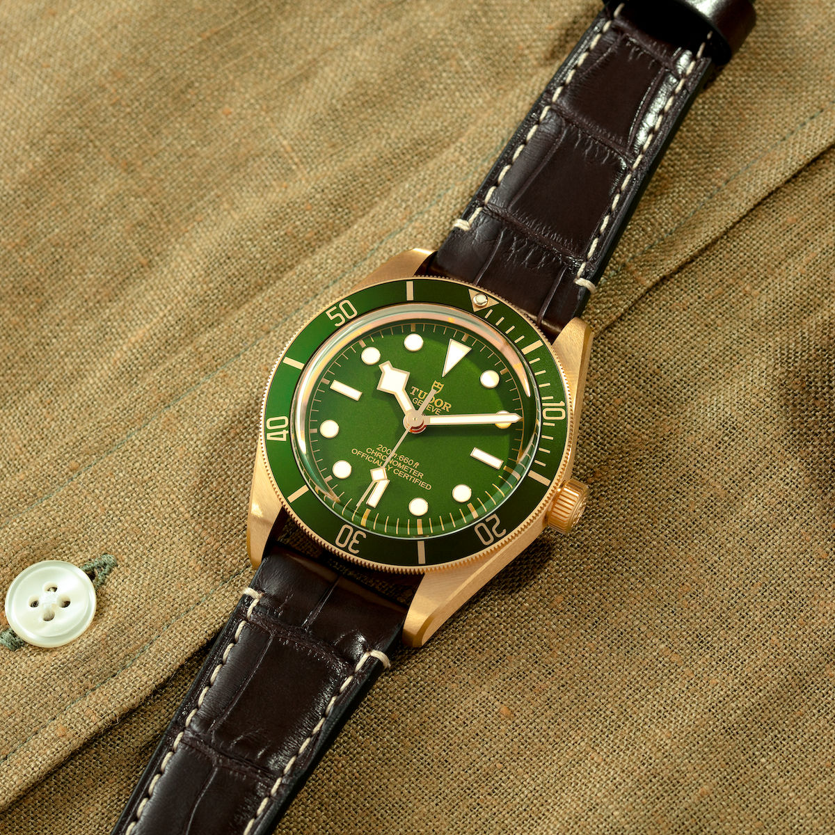 Green sunburst best sale dial watch