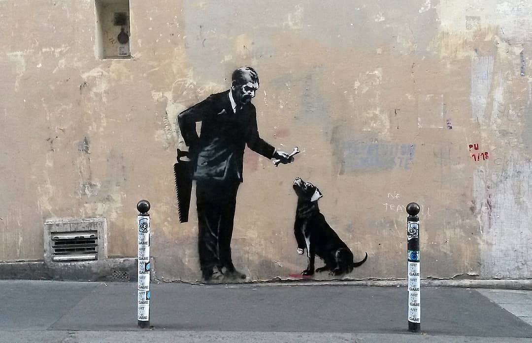Banksy mural man and dog